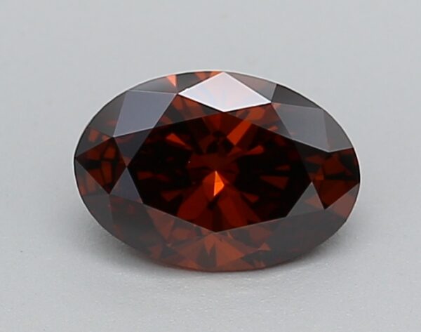 0.65 LGD Carat  FANCY DEEP ORANGE Color VVS2 OVAL Shape IGI